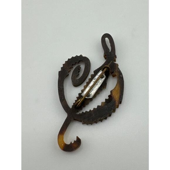 Faux Tortoiseshell Quetzal Music Note Brooch - Picture 1 of 3